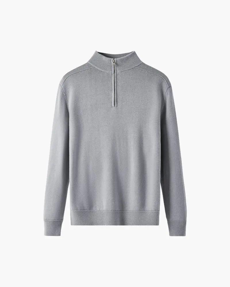 Pull zippé en laine 100% mérinos de la marque Old Money, visible avec fermeture éclair et col montant.