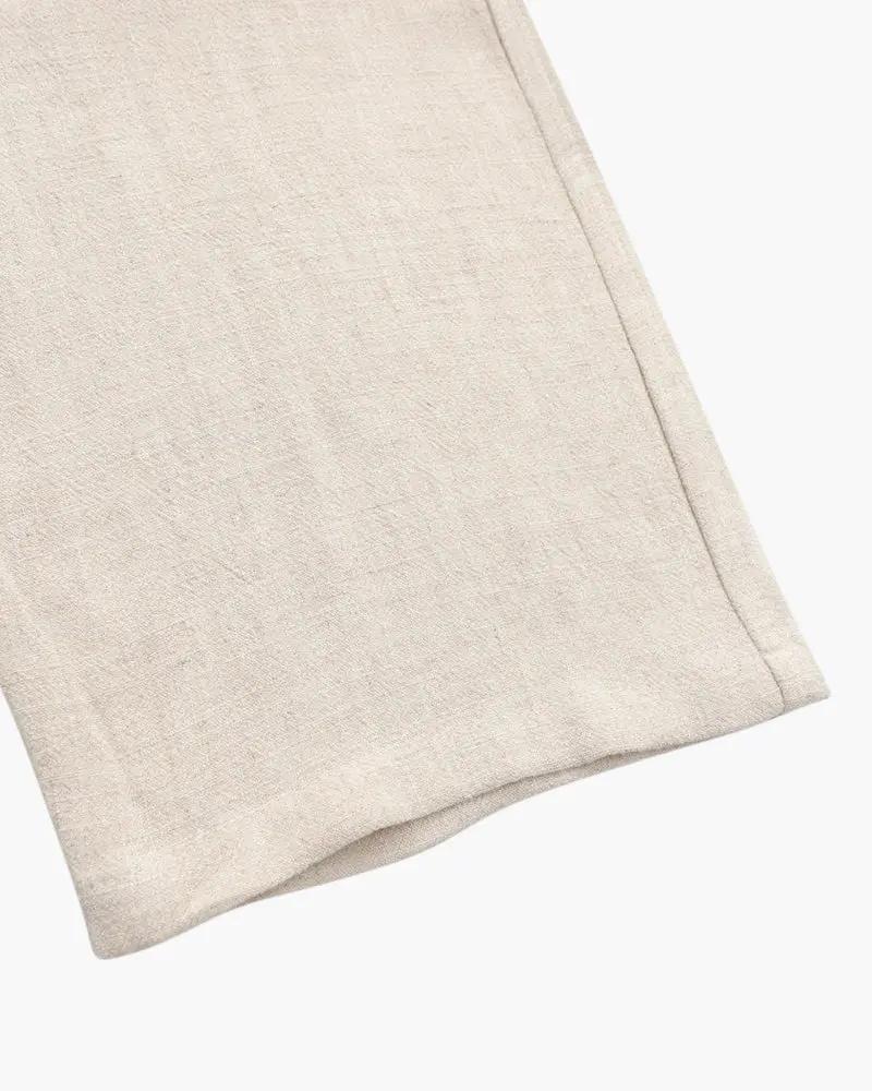 Vêtements beige du set Monochrome de Old Money WorldWide, style élégant et monochrome pour un look sophistiqué.