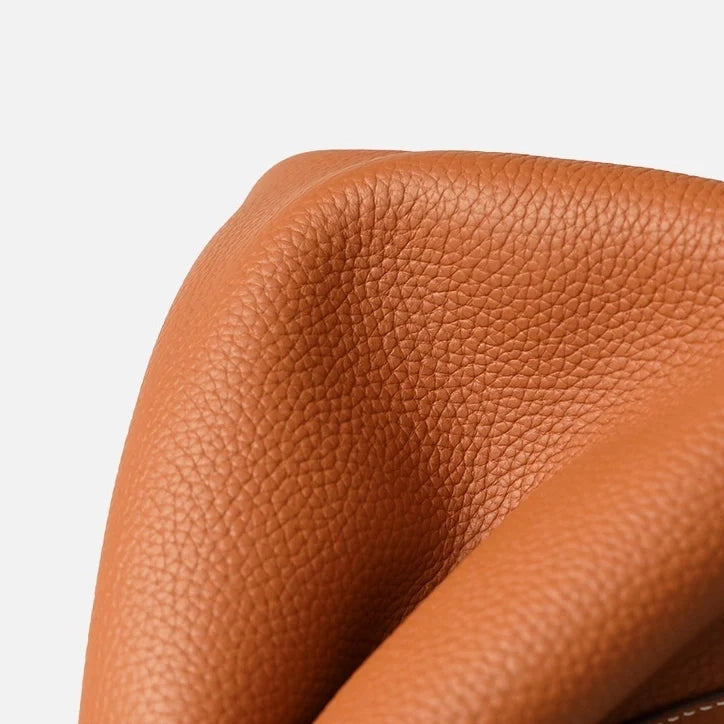 Sac seau orange Danoir Paris, sac à main en cuir avec bandoulière, vue de face sur fond neutre.