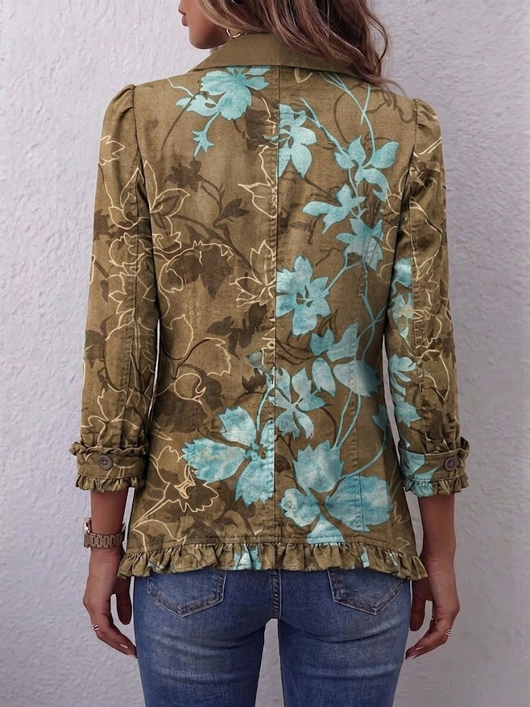 Veste bohème fleurie blanche Danoir Paris avec dégradé et volants, style vintage, détails floraux et tissu léger.