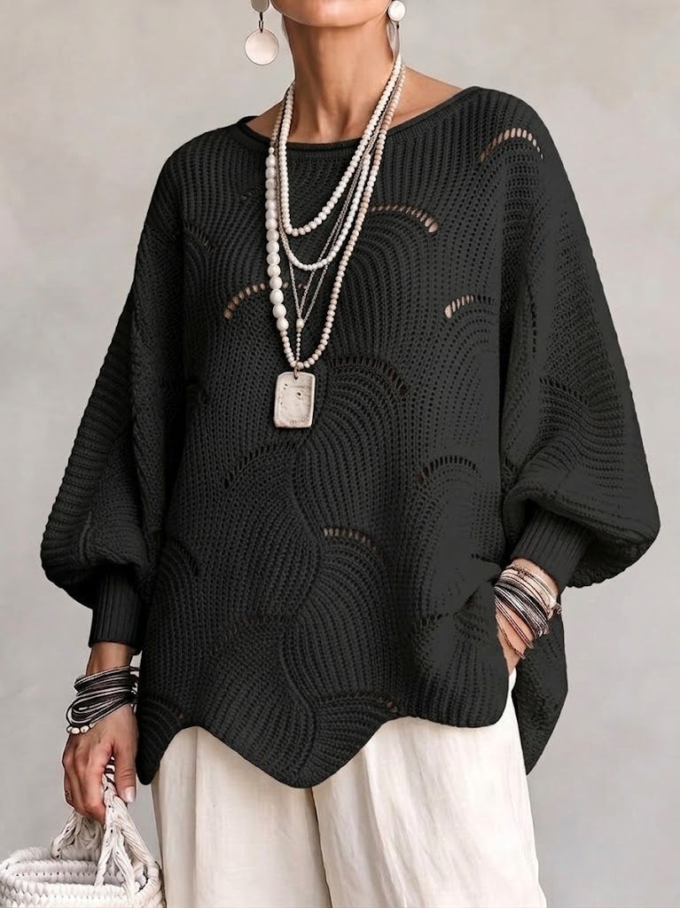 Haut en tricot Danoir Paris à manches lanternes amples avec motif en vagues creuses, tissu léger et élégant.