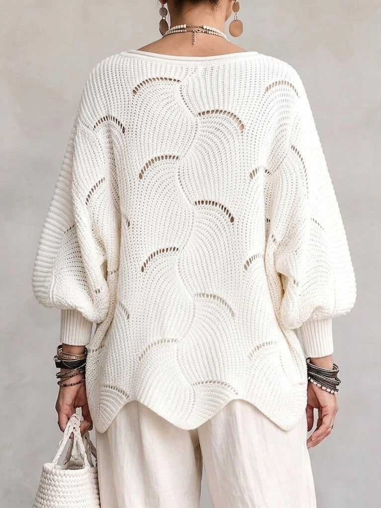 Haut en tricot Danoir Paris à manches lanternes amples avec motif en vagues creuses, tissu doux et texturé.