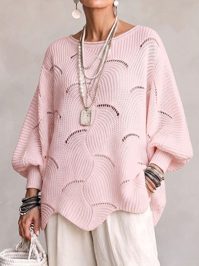 Haut en tricot Danoir Paris à manches lanternes amples avec motif en vagues creuses, design élégant et confortable.