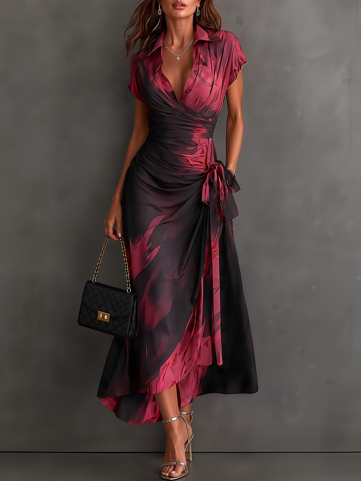 Robe midi Danoir Paris Rosalie avec imprimé abstrait, col V, manches courtes, ceinture et ourlet asymétrique à volant.