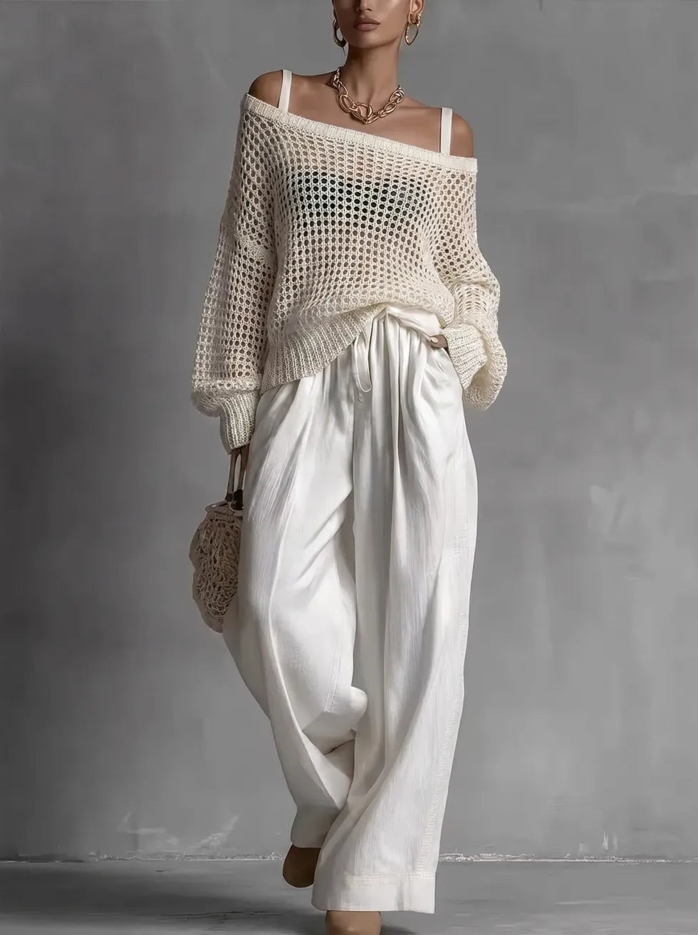 Ensemble élégant Claribel™ en deux pièces de Danoir Paris, en tissu coloré, présenté sur un fond neutre.